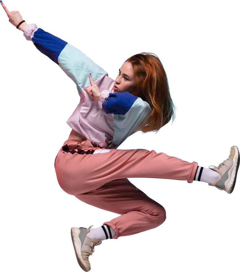 Woman leaping against the sky